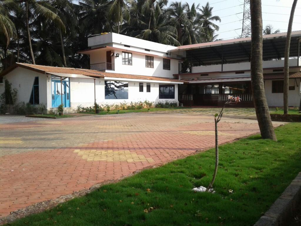 Nisarga Nirvana River House 门格洛尔 外观 照片