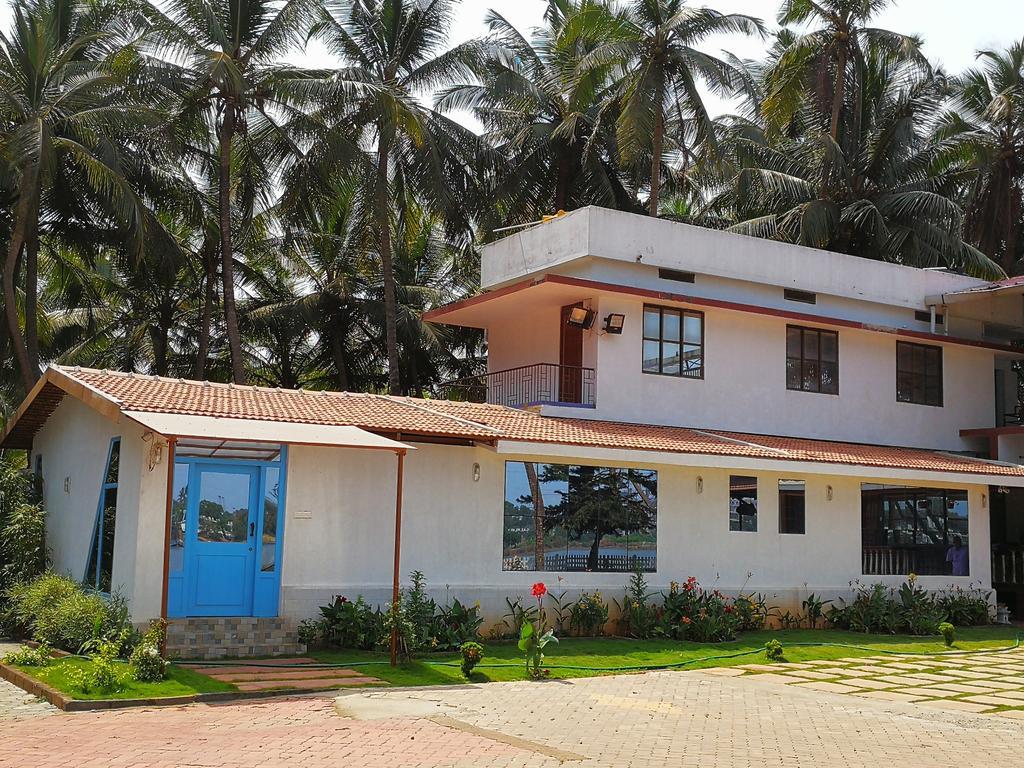Nisarga Nirvana River House 门格洛尔 外观 照片