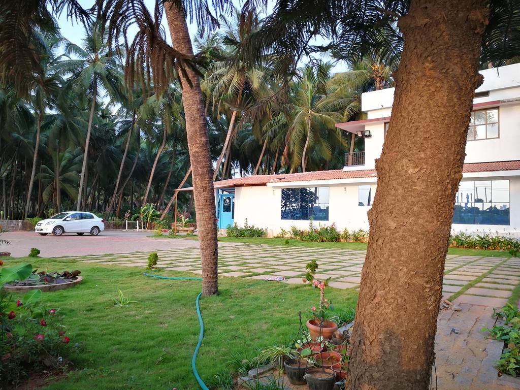 Nisarga Nirvana River House 门格洛尔 外观 照片